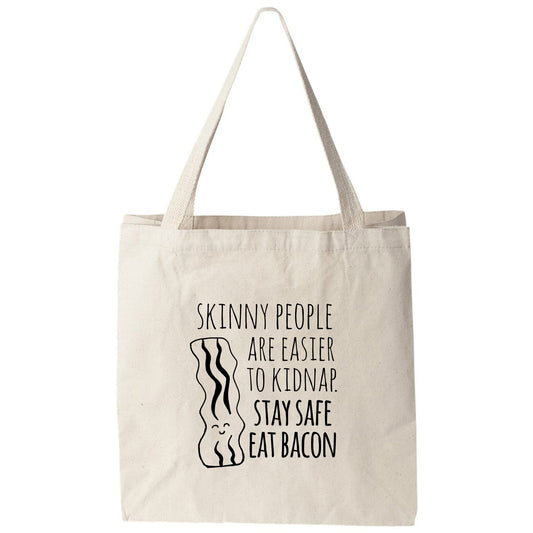 a tote bag that says skinny people are easier to kdwap stay