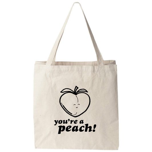 a tote bag with a picture of an apple on it