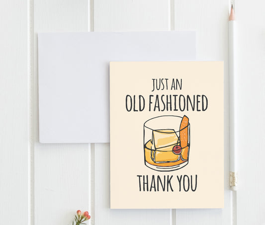 a card with a picture of a glass of whiskey on it