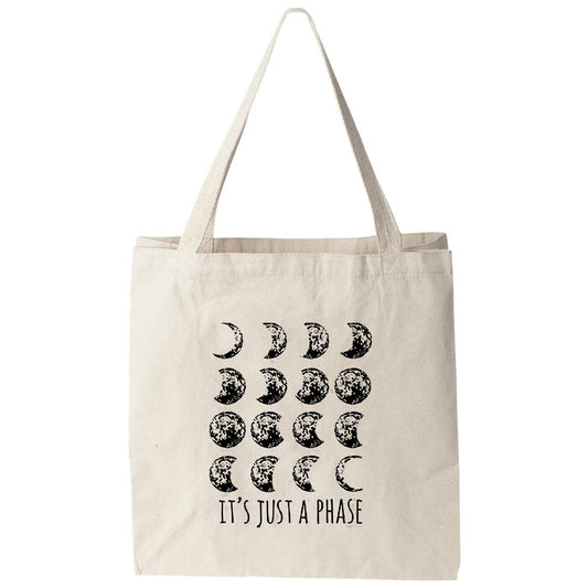 a tote bag that says it's just a phase