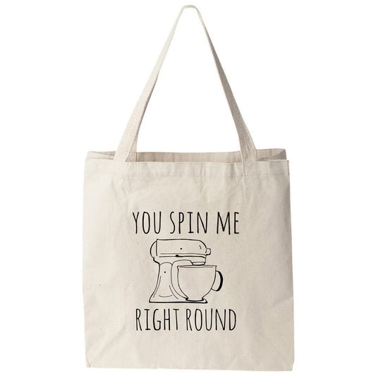 a tote bag that says you spin me right round