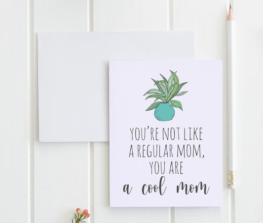 a card with a picture of a plant on it