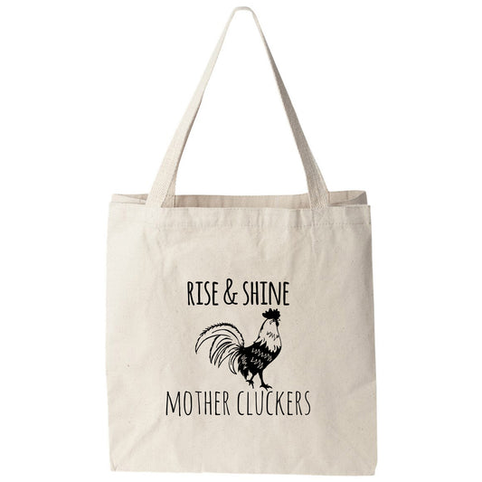 a tote bag that says rise and shine mother cluckers