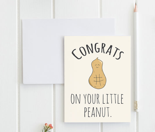 a card that says congrats on your little peanut
