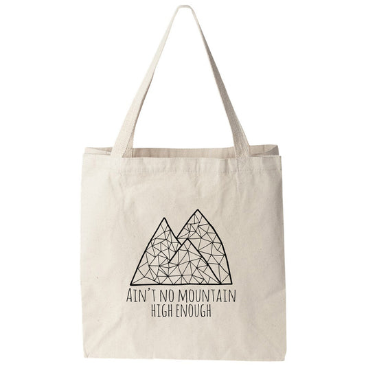 a tote bag with a mountain design on it