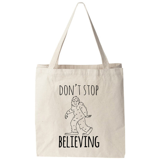 a tote bag with a picture of a bigfoot on it
