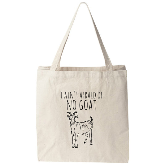 a tote bag that says i am't afraid of no goat