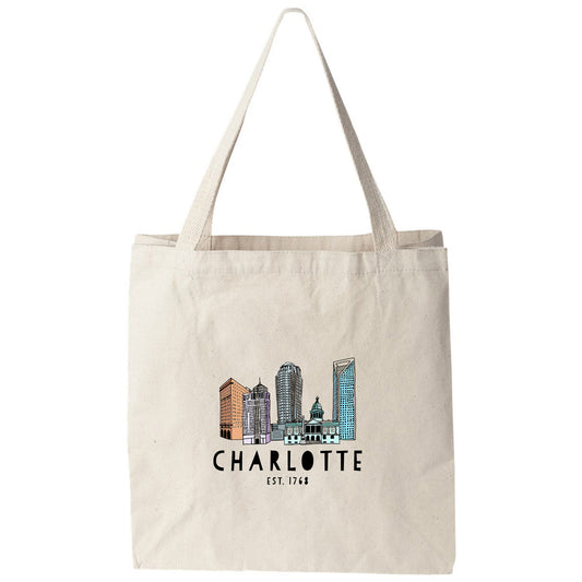 a tote bag with the charlotte skyline on it