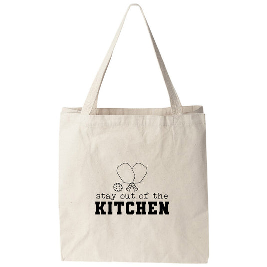 a tote bag that says stay out of the kitchen
