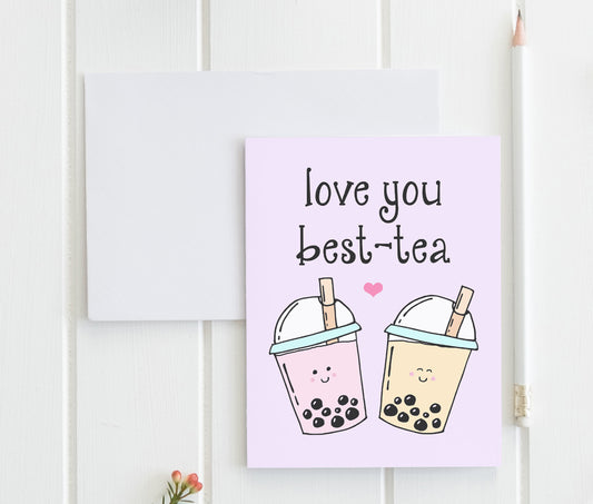 a card with two cups of tea on it