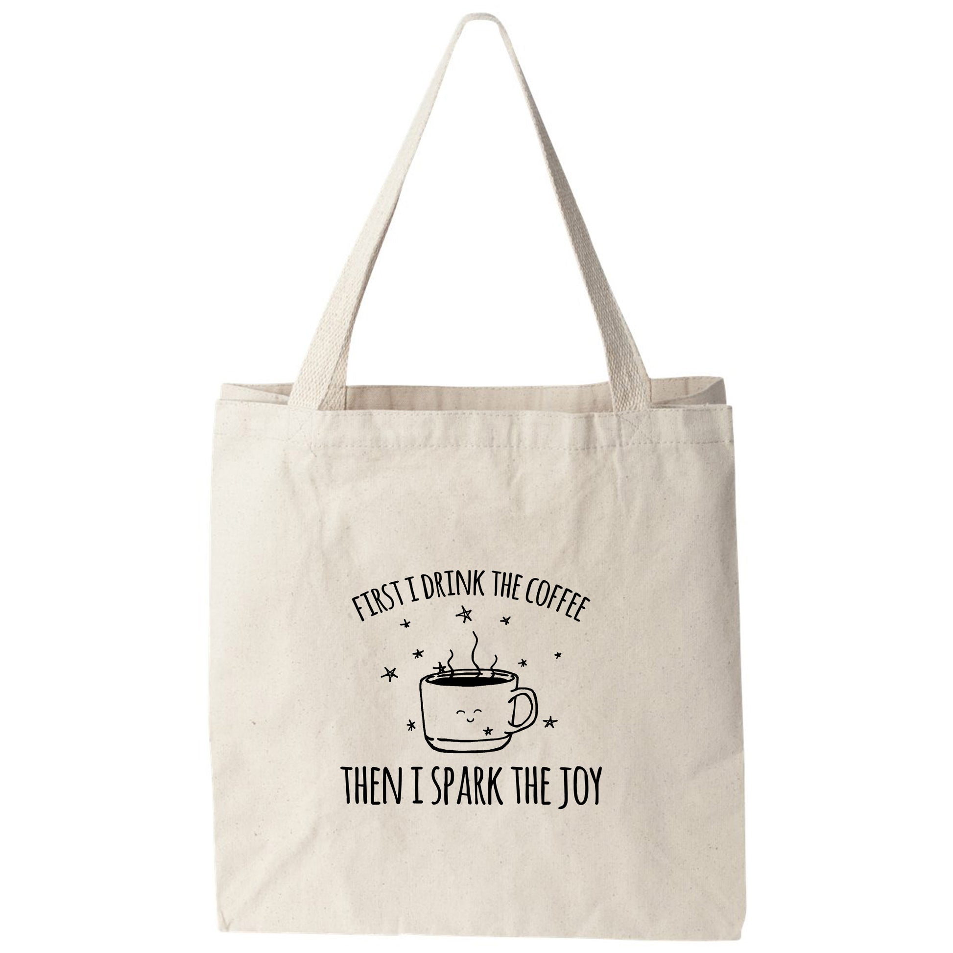 a tote bag with the words coffee then i spark the joy