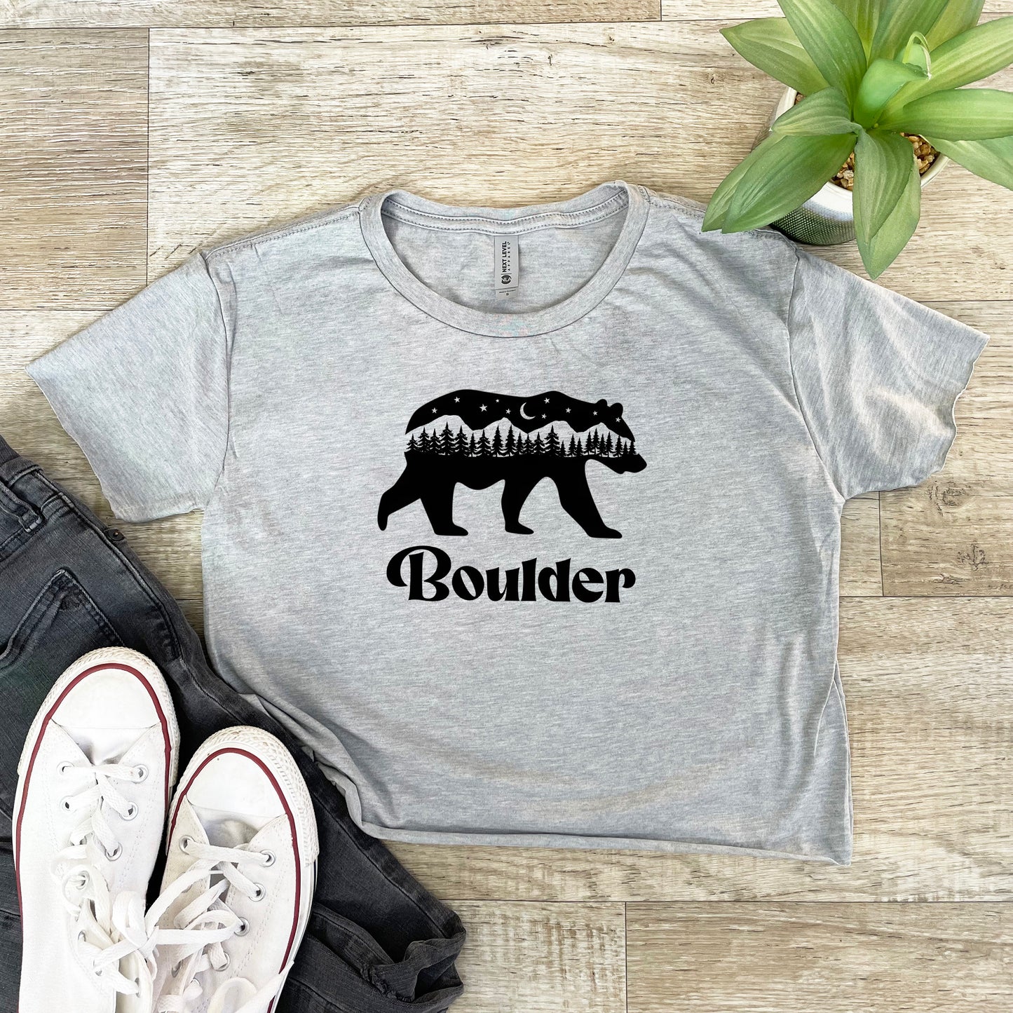 a t - shirt that says boulder with a bear on it