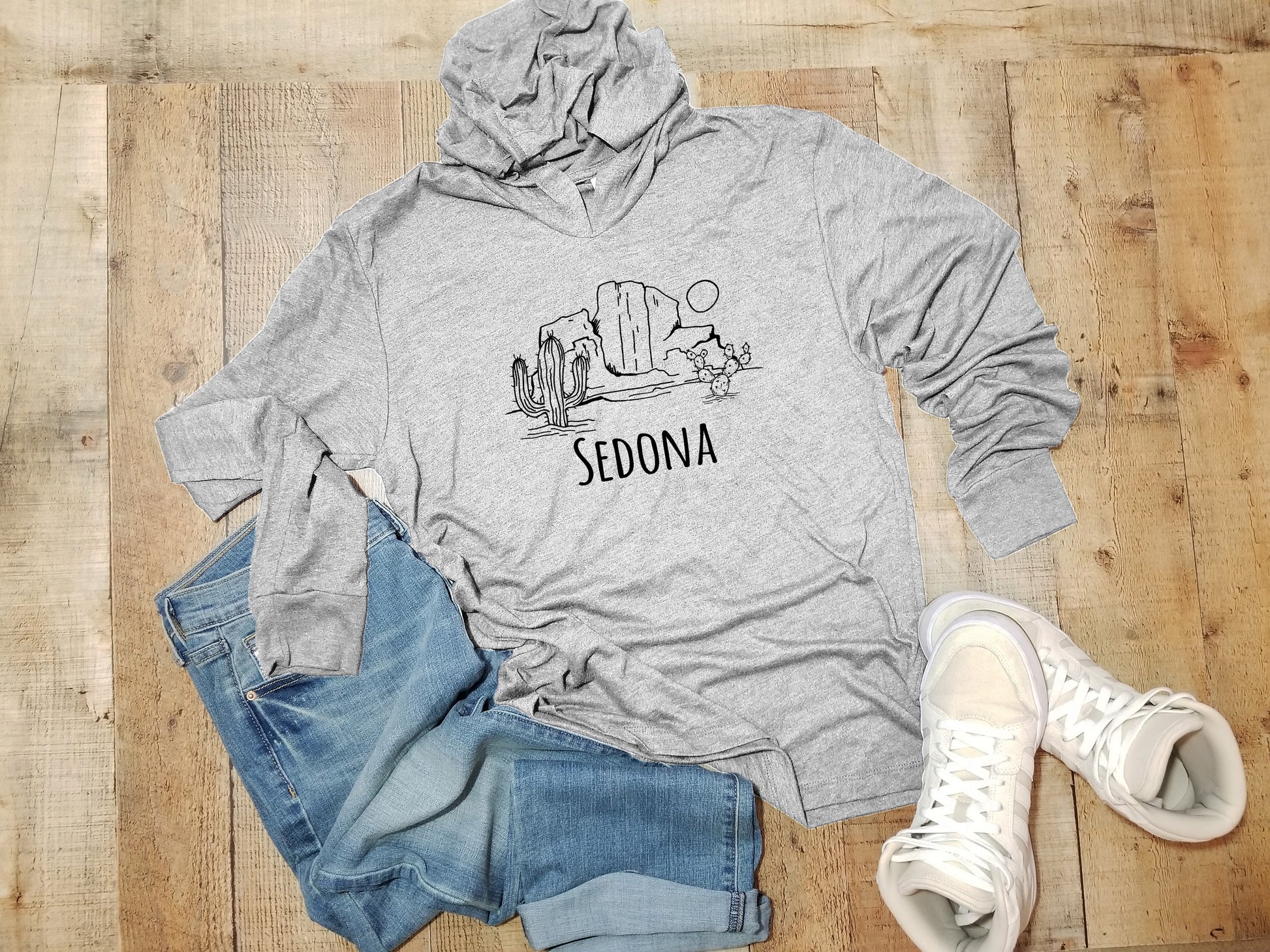 a grey hoodie with the word sedona printed on it