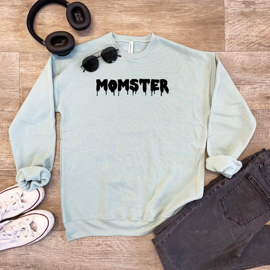 a sweater with the word monster printed on it