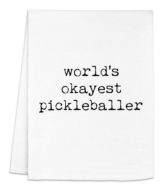 a white dish towel with the words world's okayest pickleballer