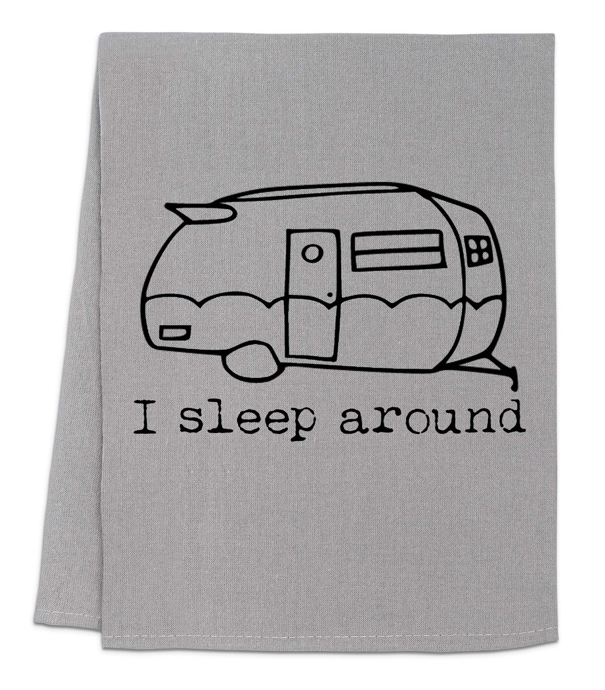 a towel with a black and white drawing of a camper