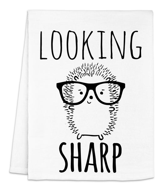 a white towel with an image of a hedge wearing glasses
