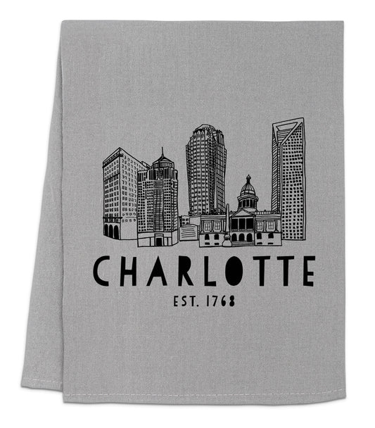 a gray towel with a black and white picture of charlotte