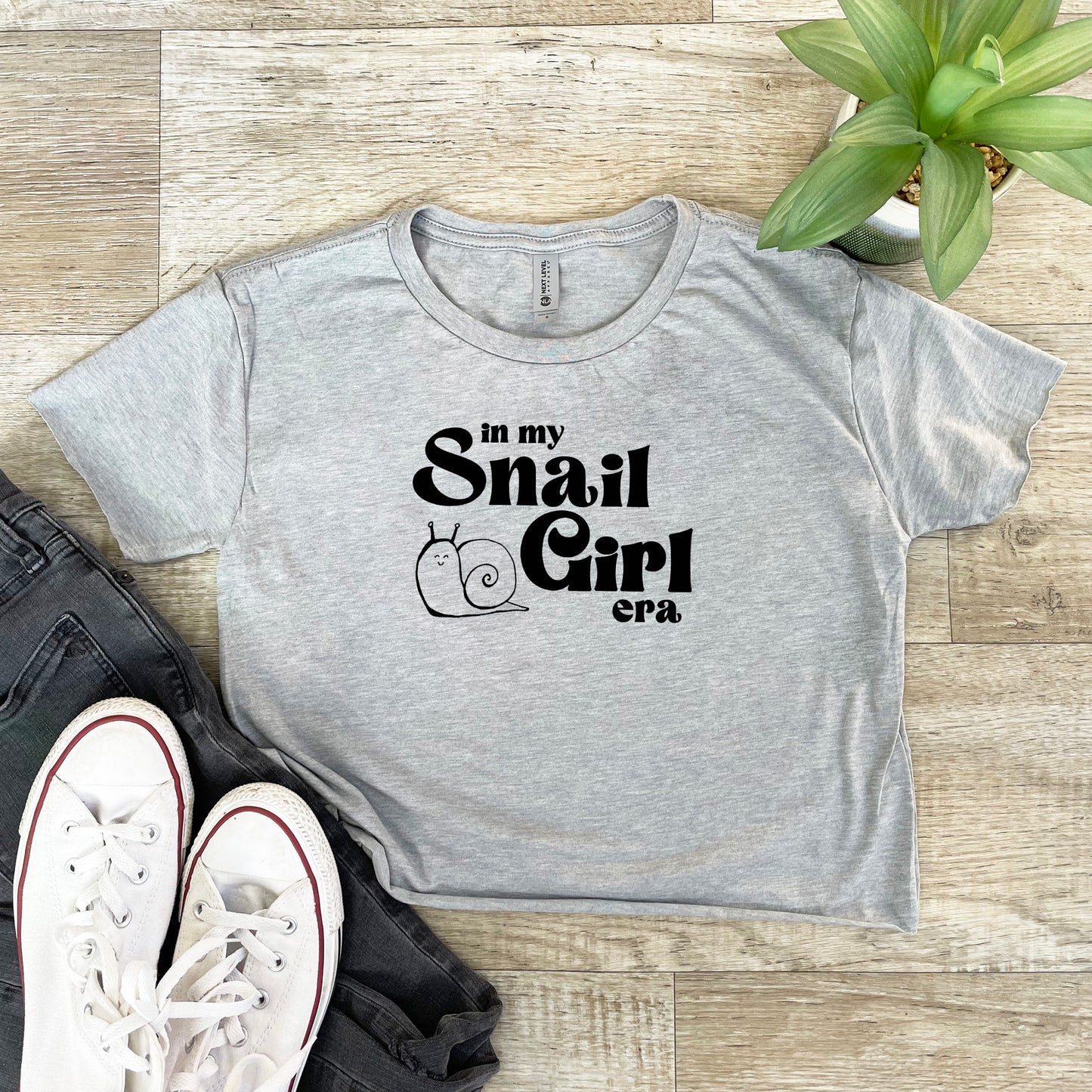 a t - shirt that says, i'm my snail girl
