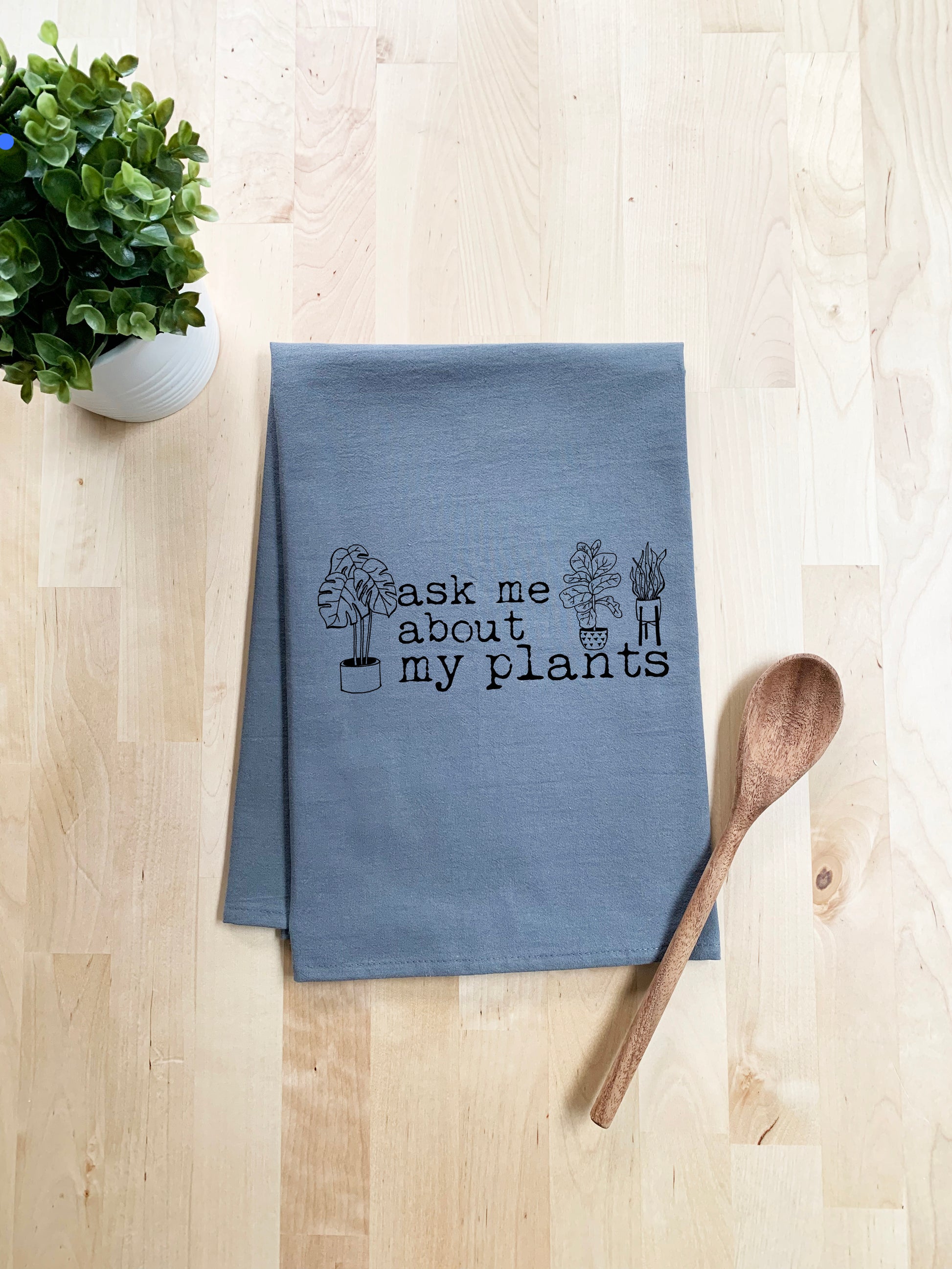 a tea towel that says ask me about my plants