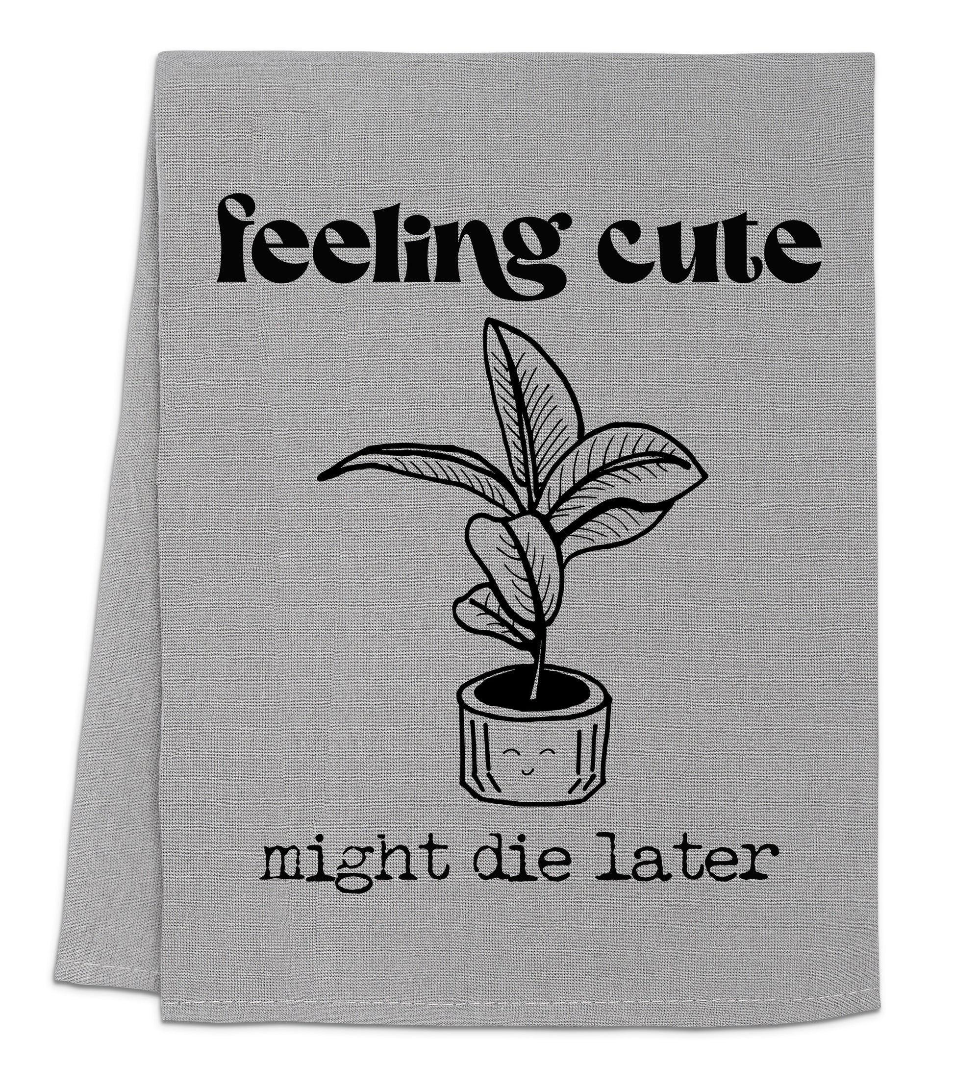 a towel with a potted plant on it