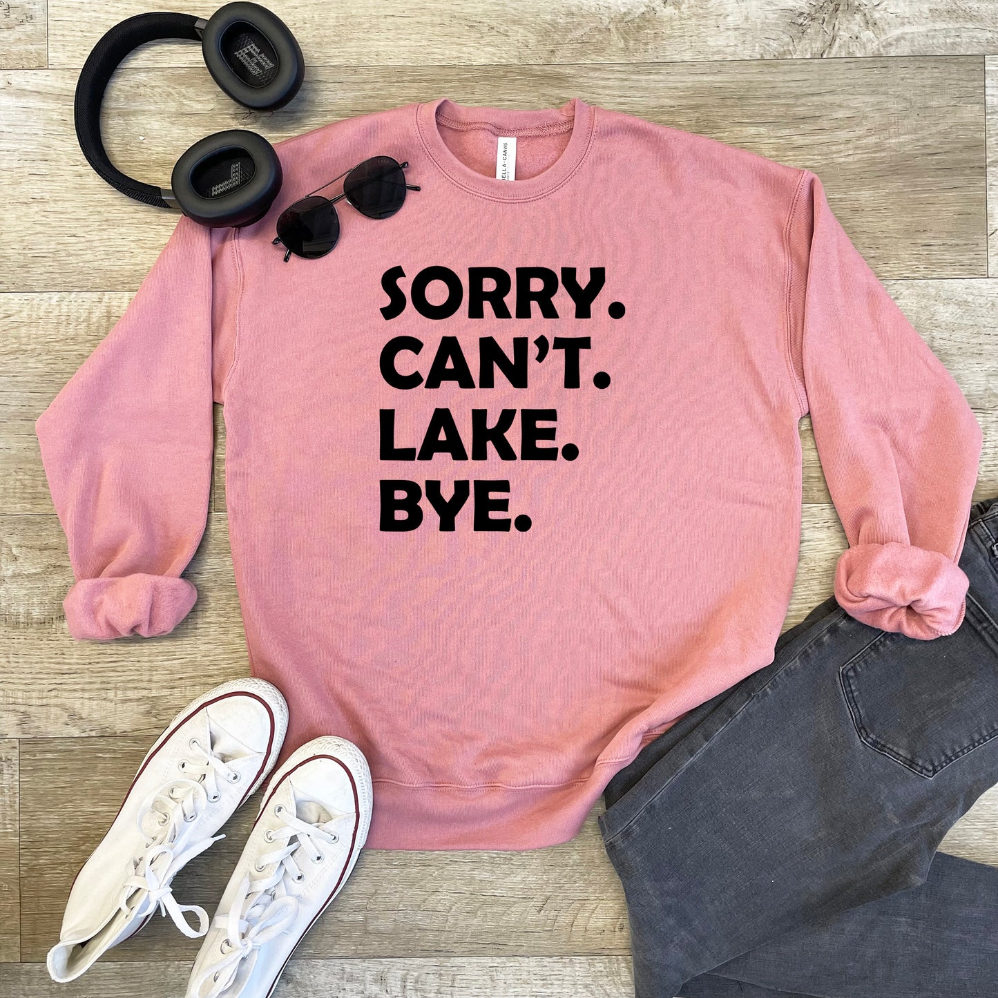 a pink sweatshirt that says sorry can't lake bye