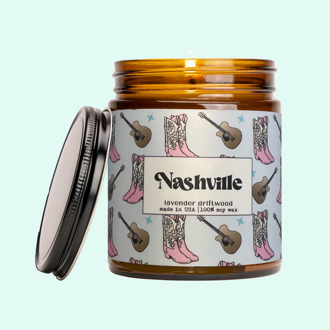 a jar of honey with a picture of boots and a guitar on it