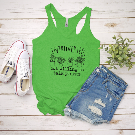 a green tank top with a plant on it