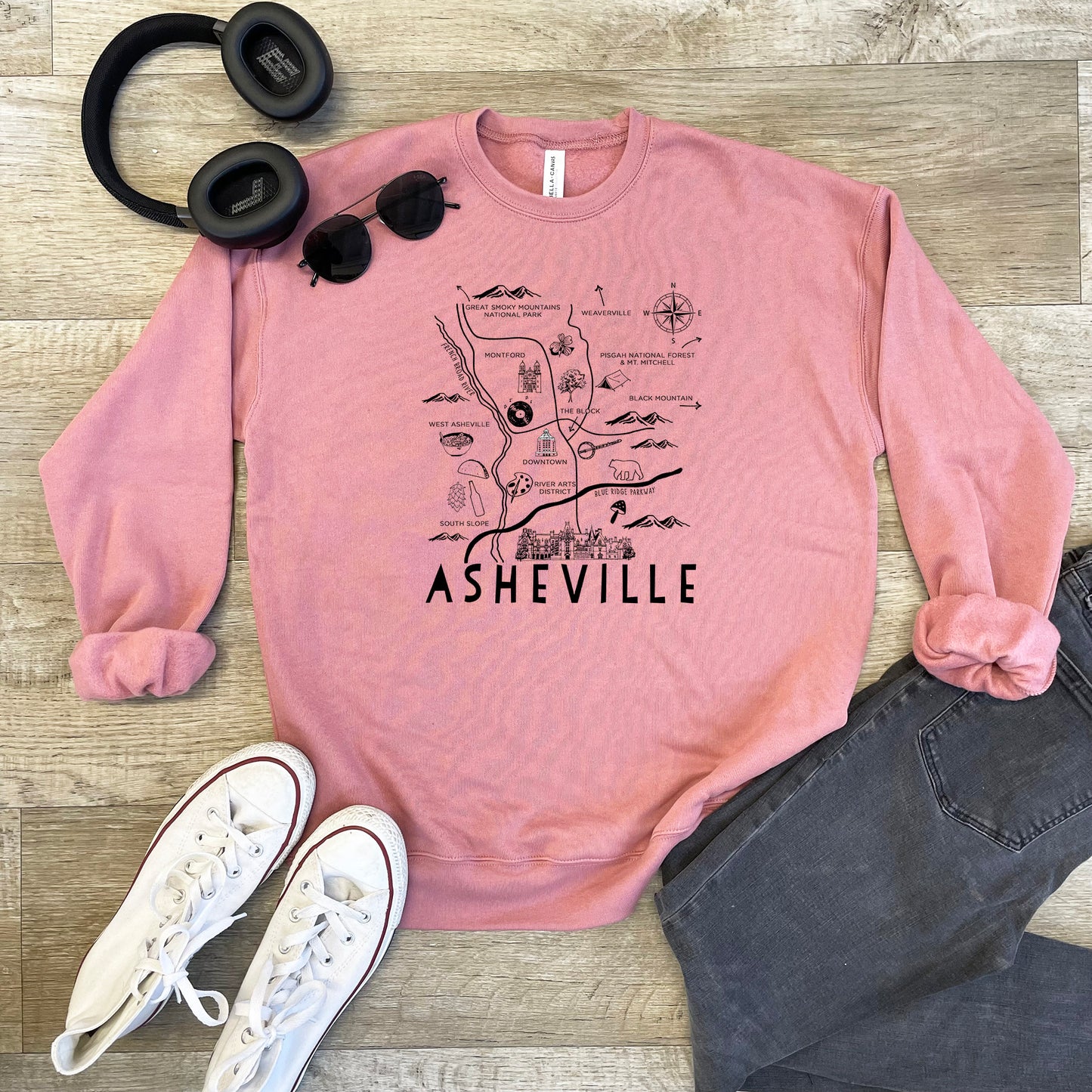 a pink sweatshirt with the words ashsville on it