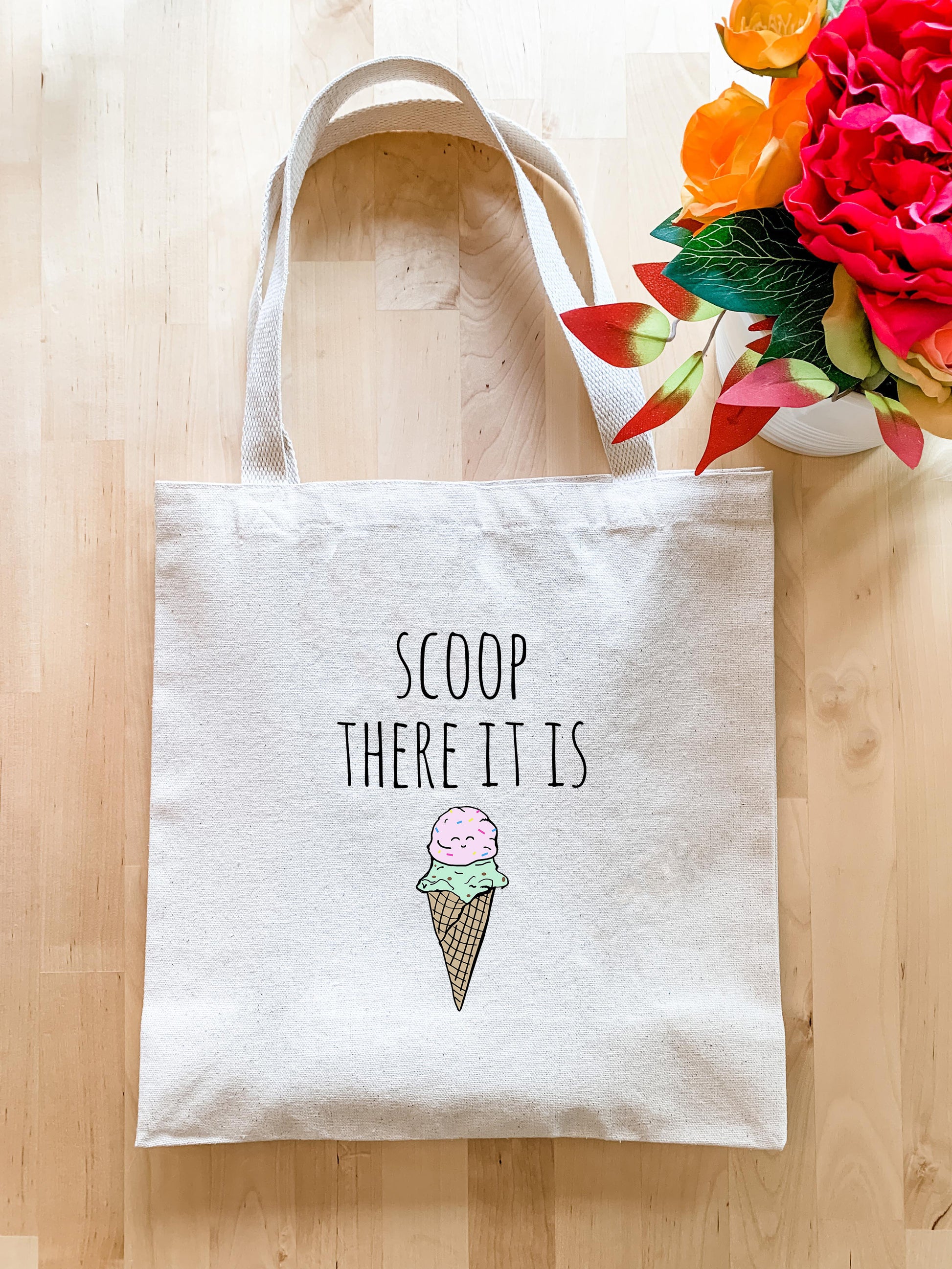 a tote bag with a picture of an ice cream cone on it