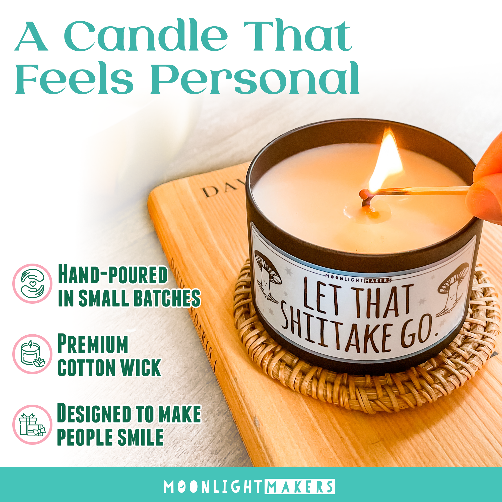 A hand-poured candle in a small batch, labeled "Let That Shit Take Go" and designed to make people smile, placed on a wooden coaster.