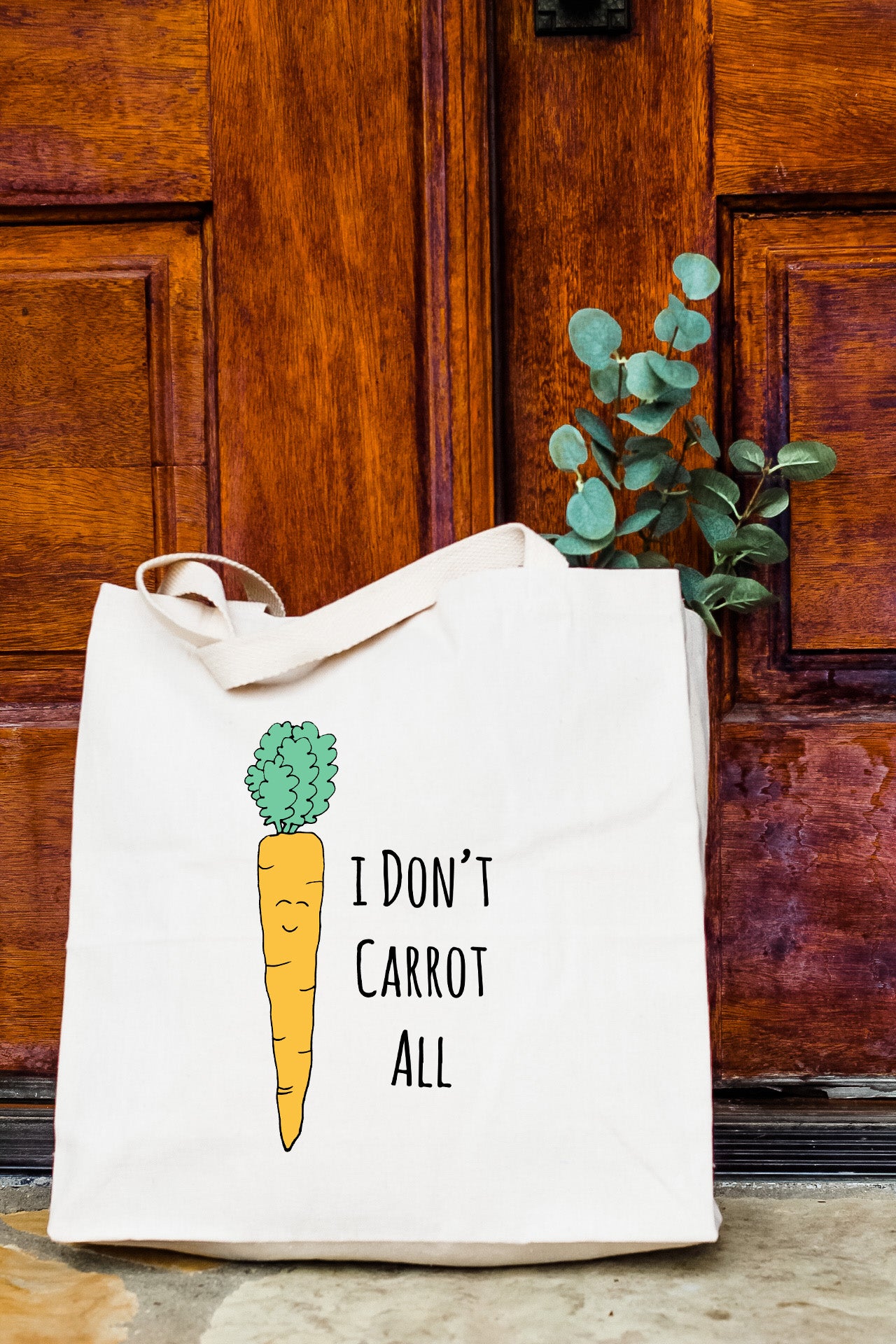 a white bag with a picture of a carrot on it