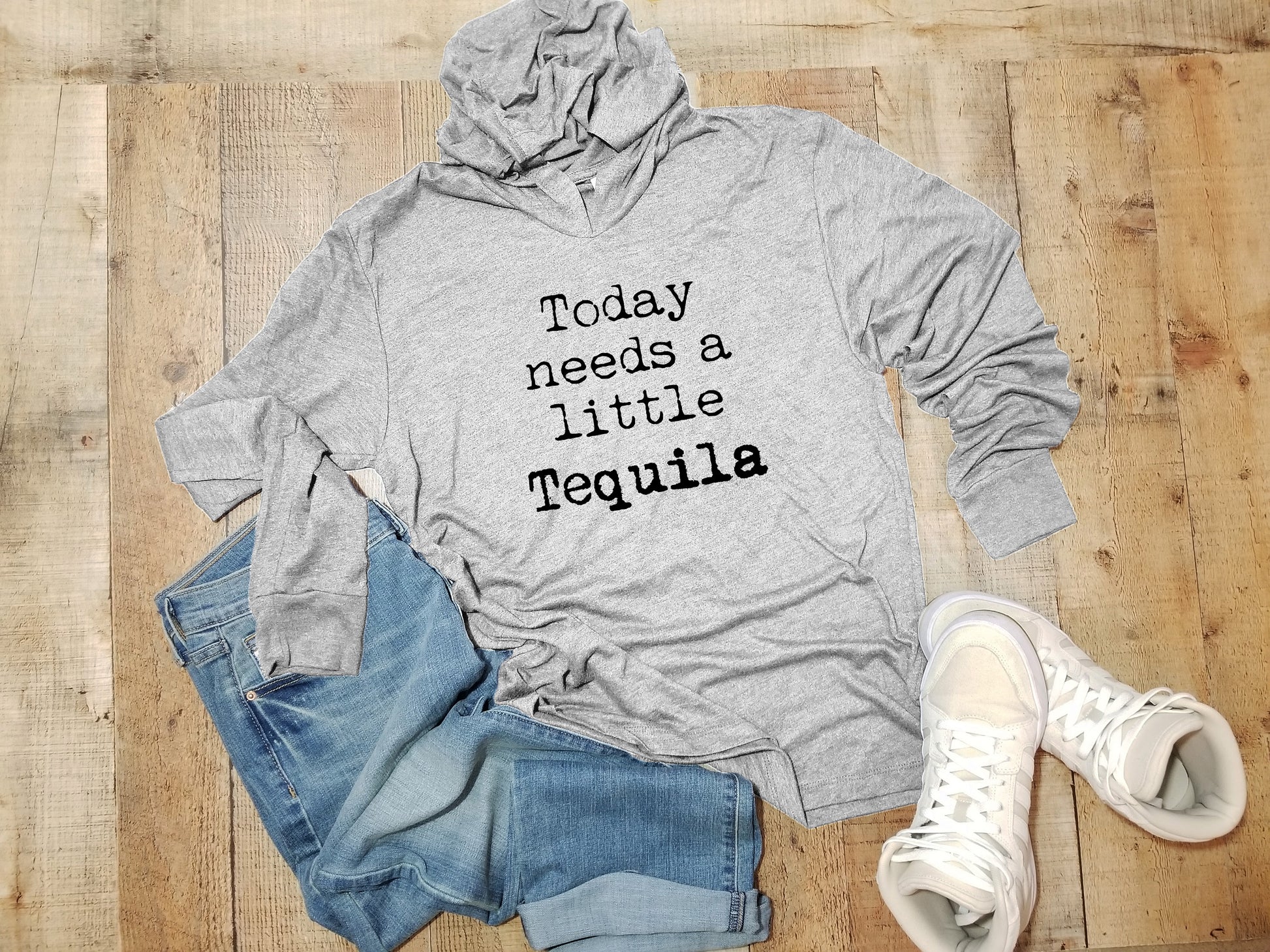 a hoodie that says today needs a little tequila