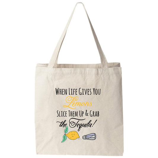 a tote bag that says when life gives you lemons slice them up and