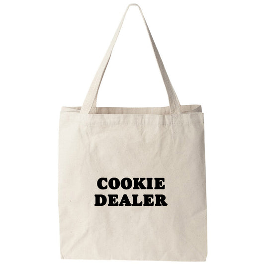a tote bag with the words cookie dealer printed on it