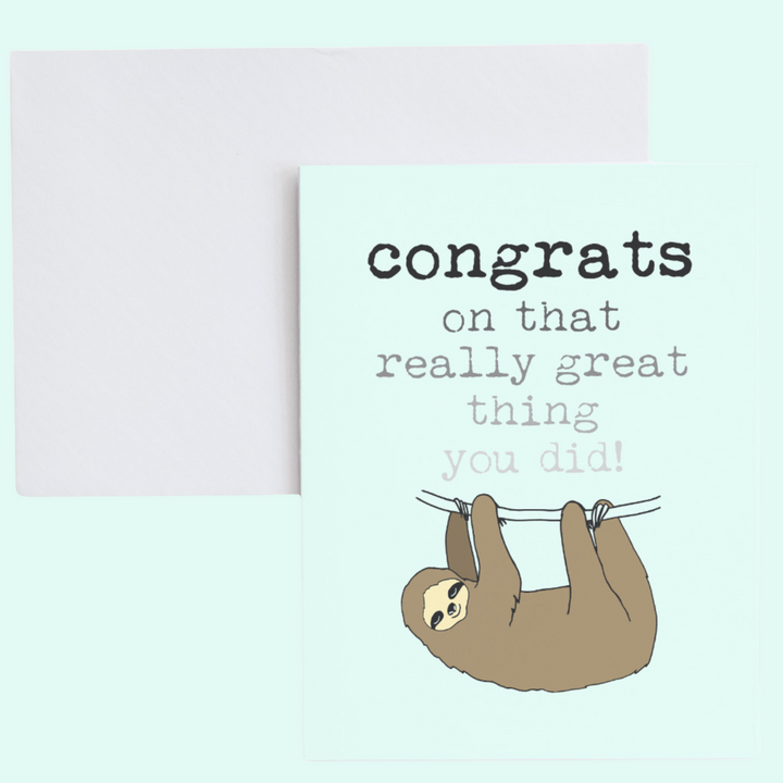 a card with a picture of a slotty hanging on a string