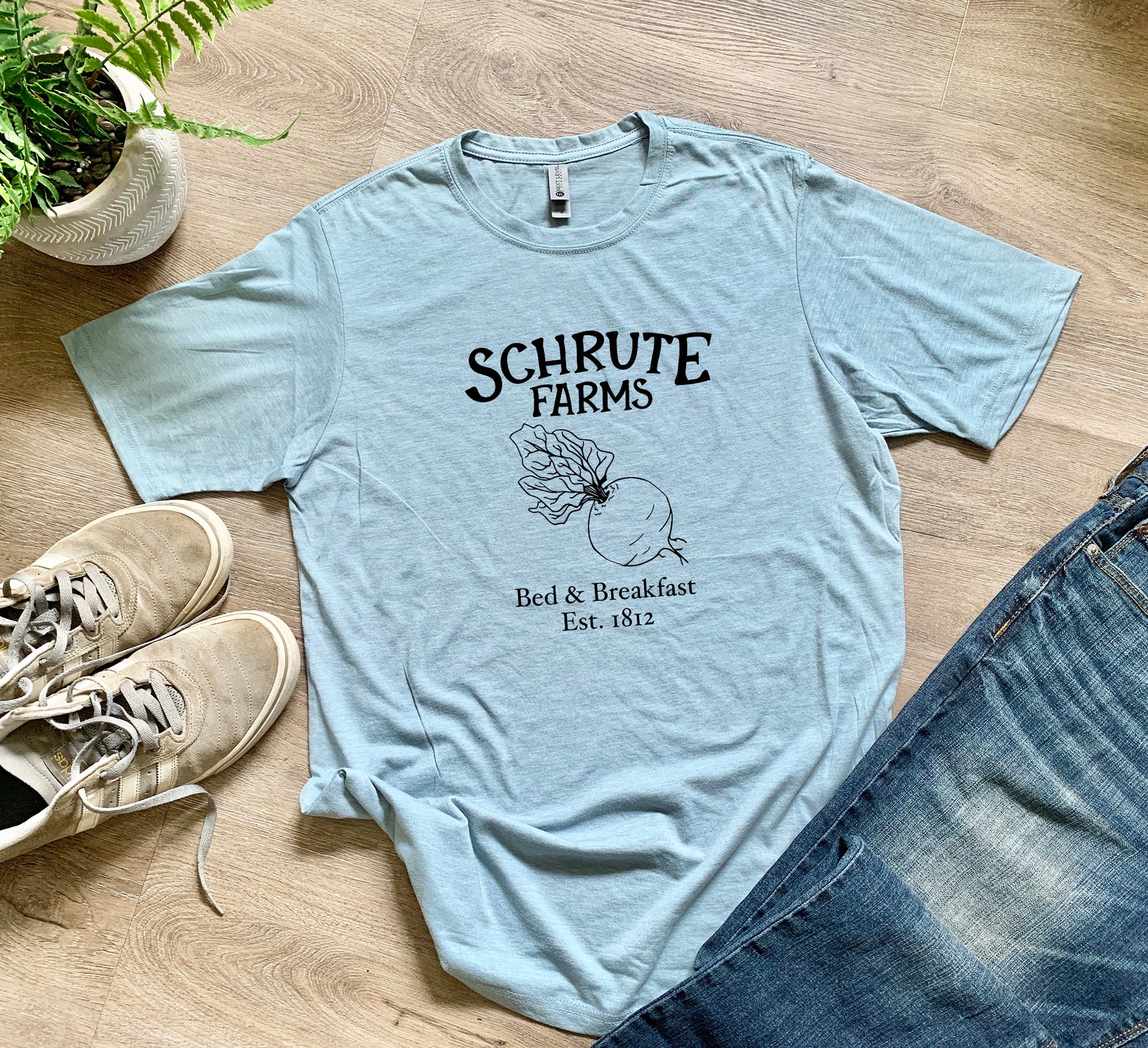 a t - shirt that says schrute farms on it