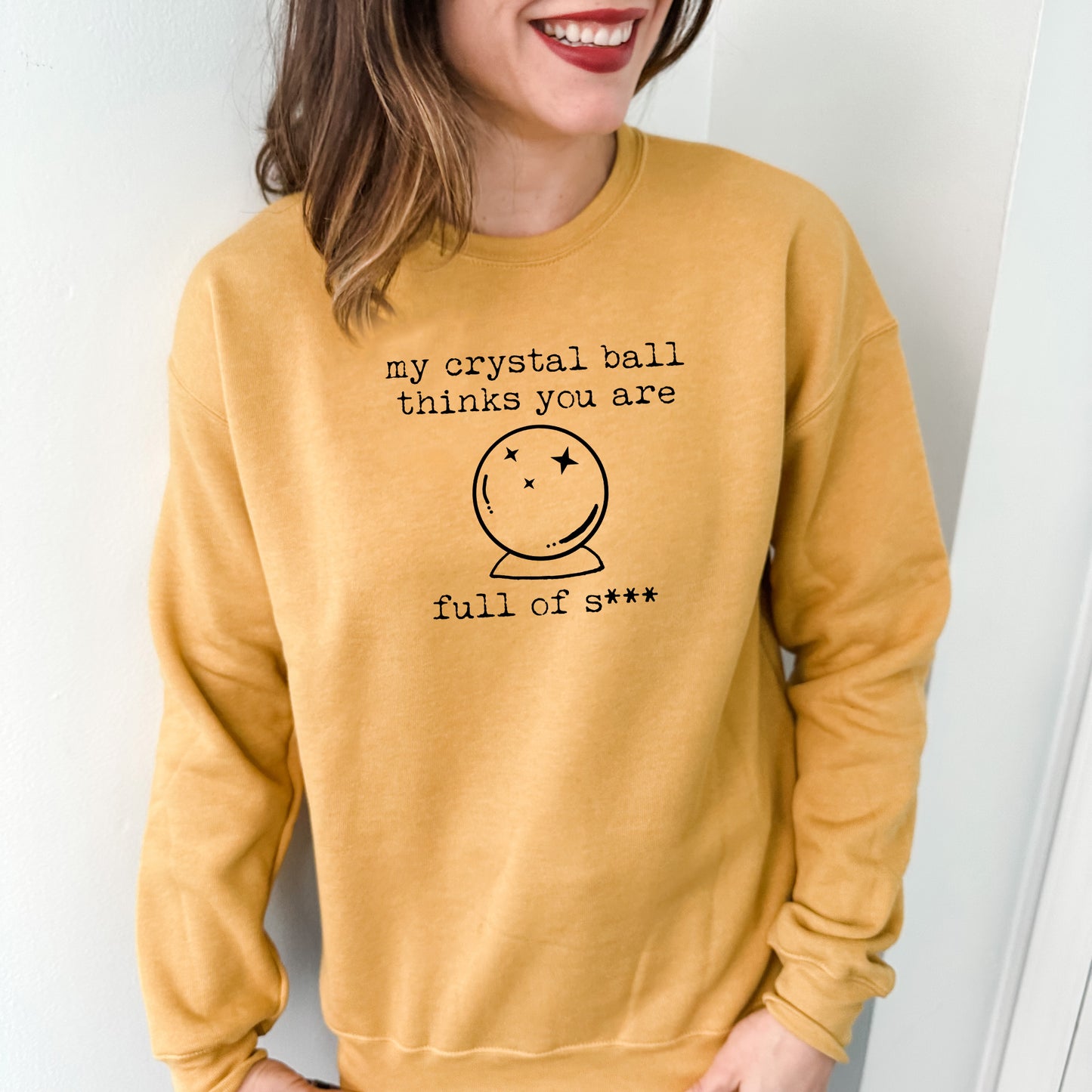 a woman wearing a sweatshirt that says, my crystal hill thinks you are full of