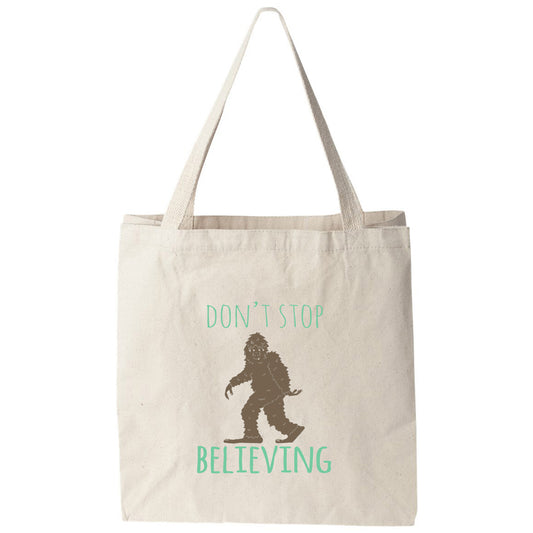 a tote bag that says don't stop believing