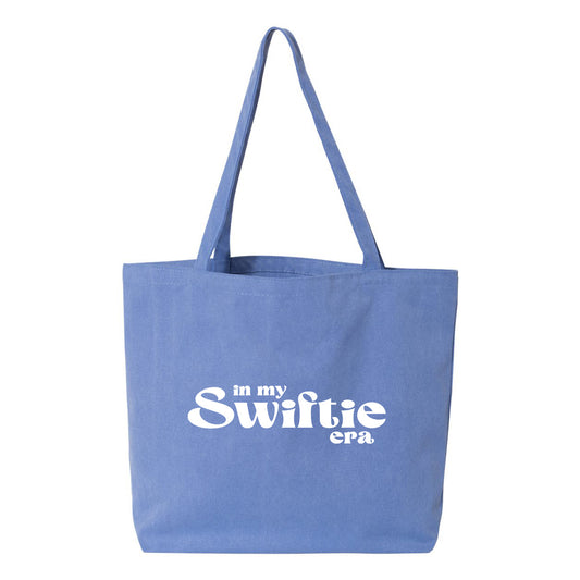 a blue tote bag with a white logo