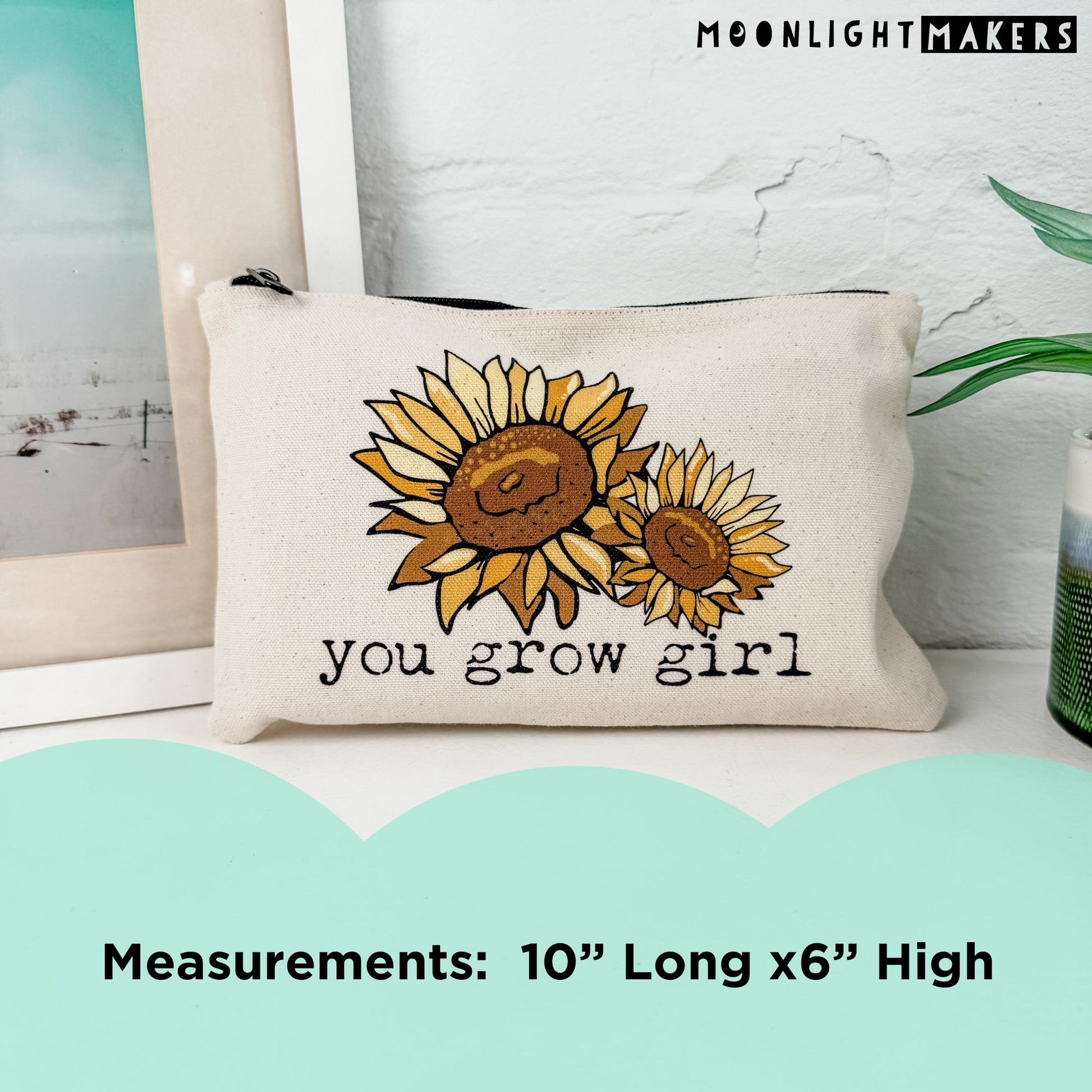 a pillow with a picture of two sunflowers on it