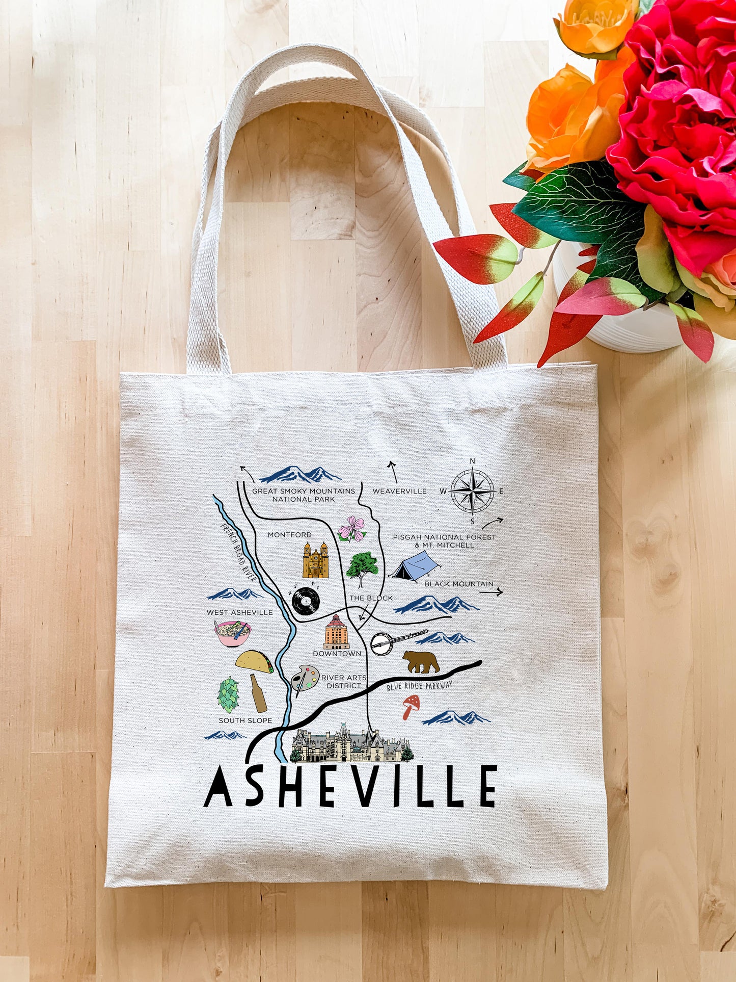 a white tote bag with a map of nashville on it