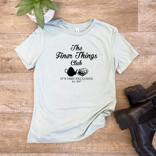 a t - shirt that says the finer things club on it