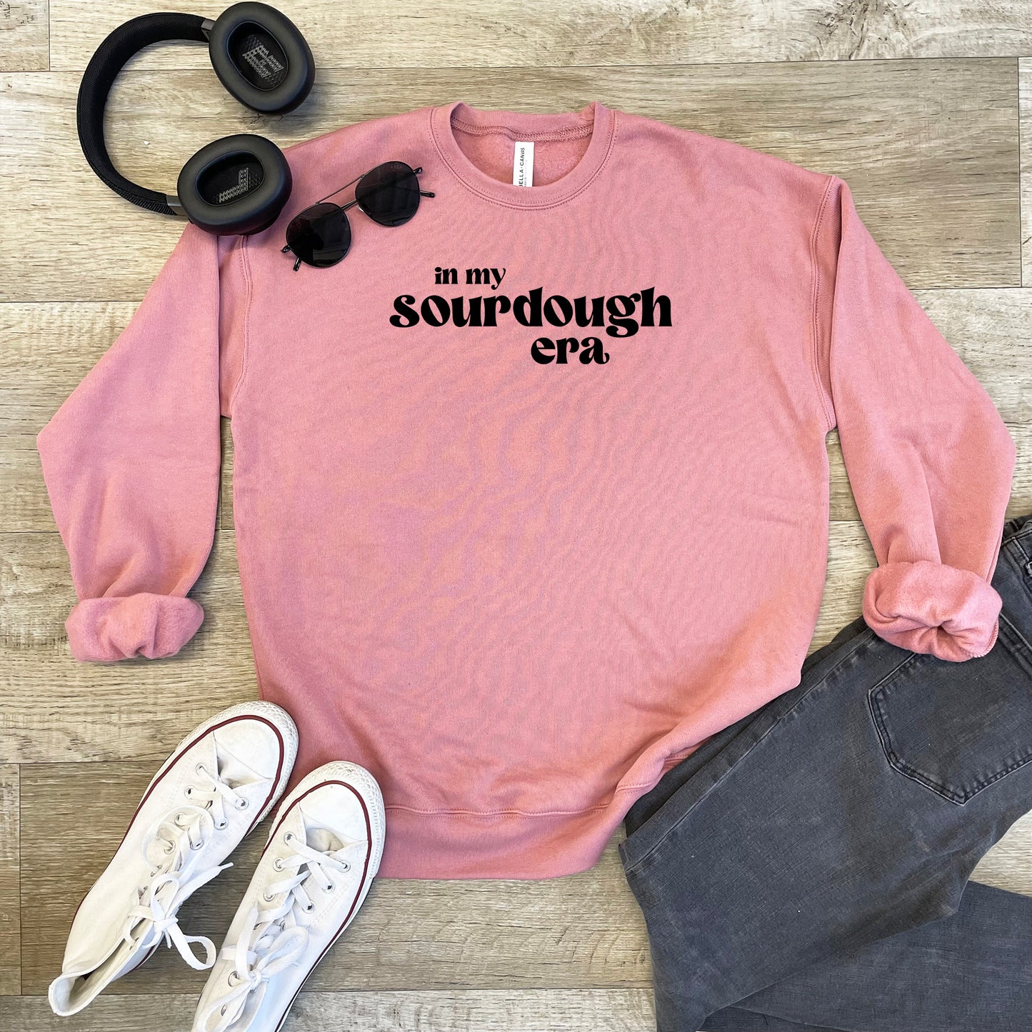 a pink sweatshirt that says in my sourdough crew