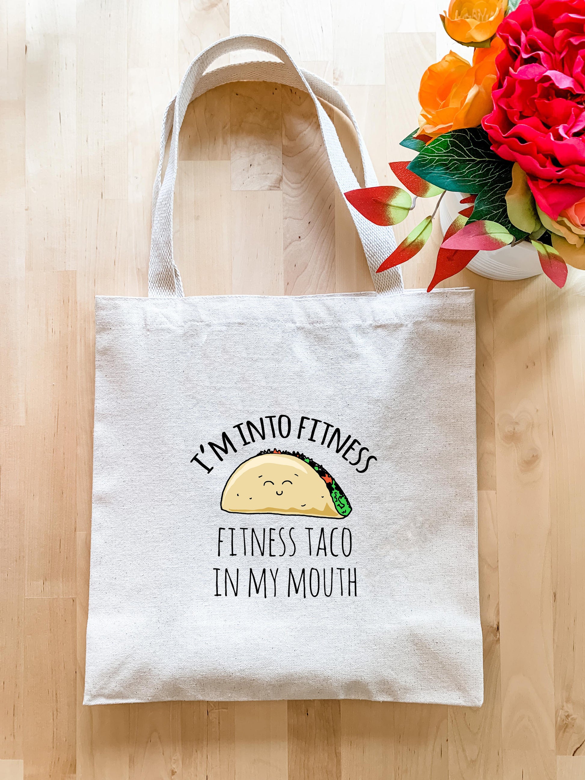a tote bag with a taco on it