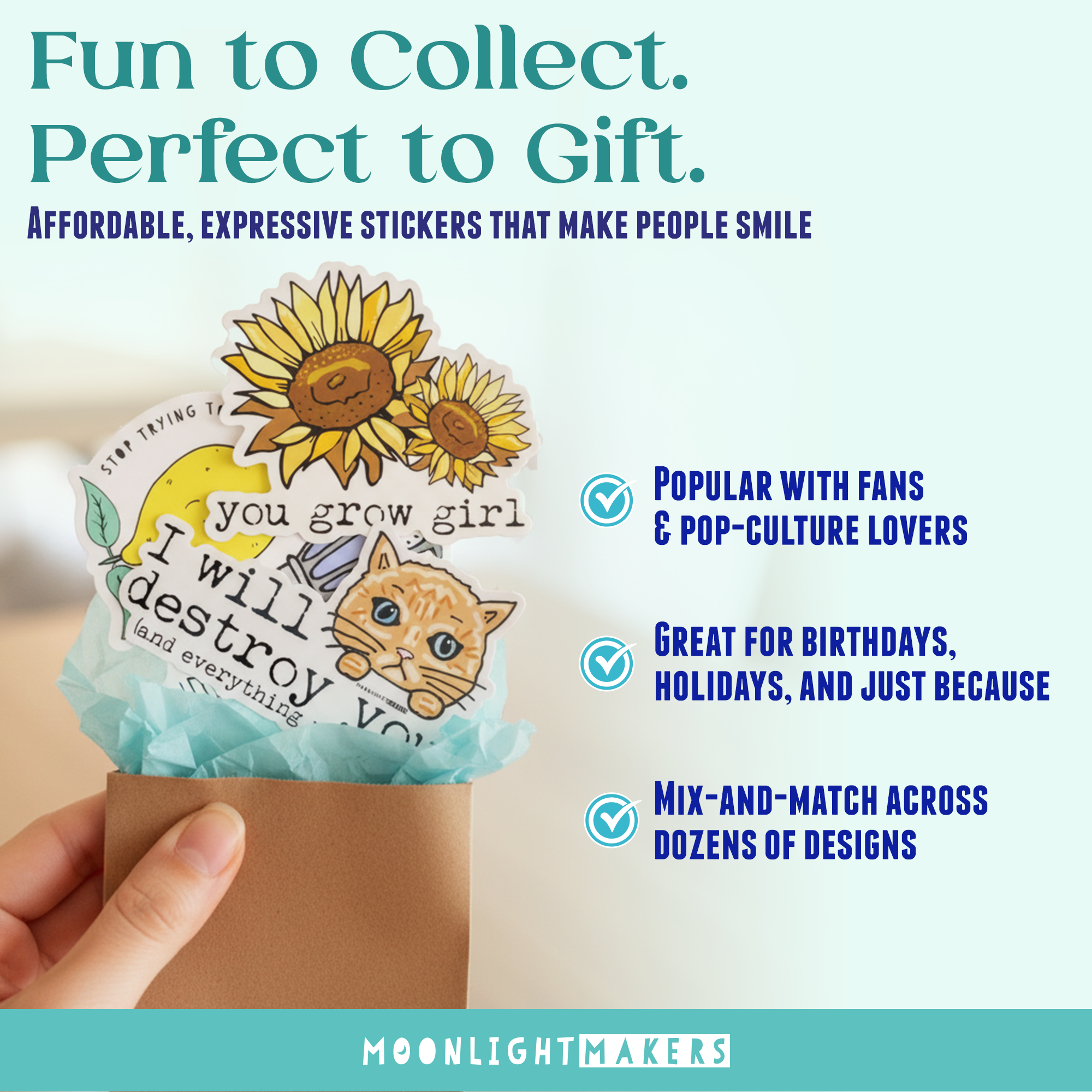 a person holding a piece of paper with a picture of a cat and sunflower