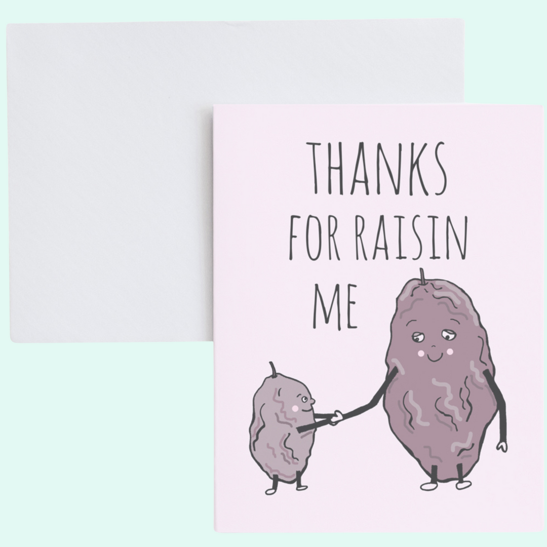 a card with a drawing of a couple of potatoes holding hands