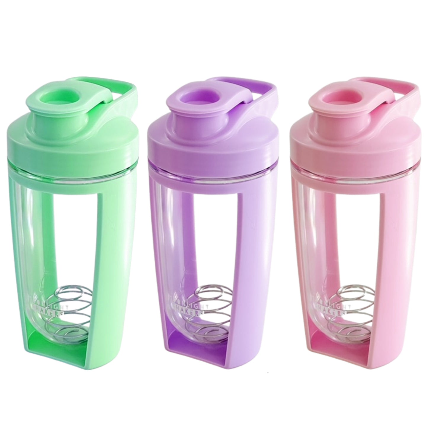 three different colored plastic cups with lids