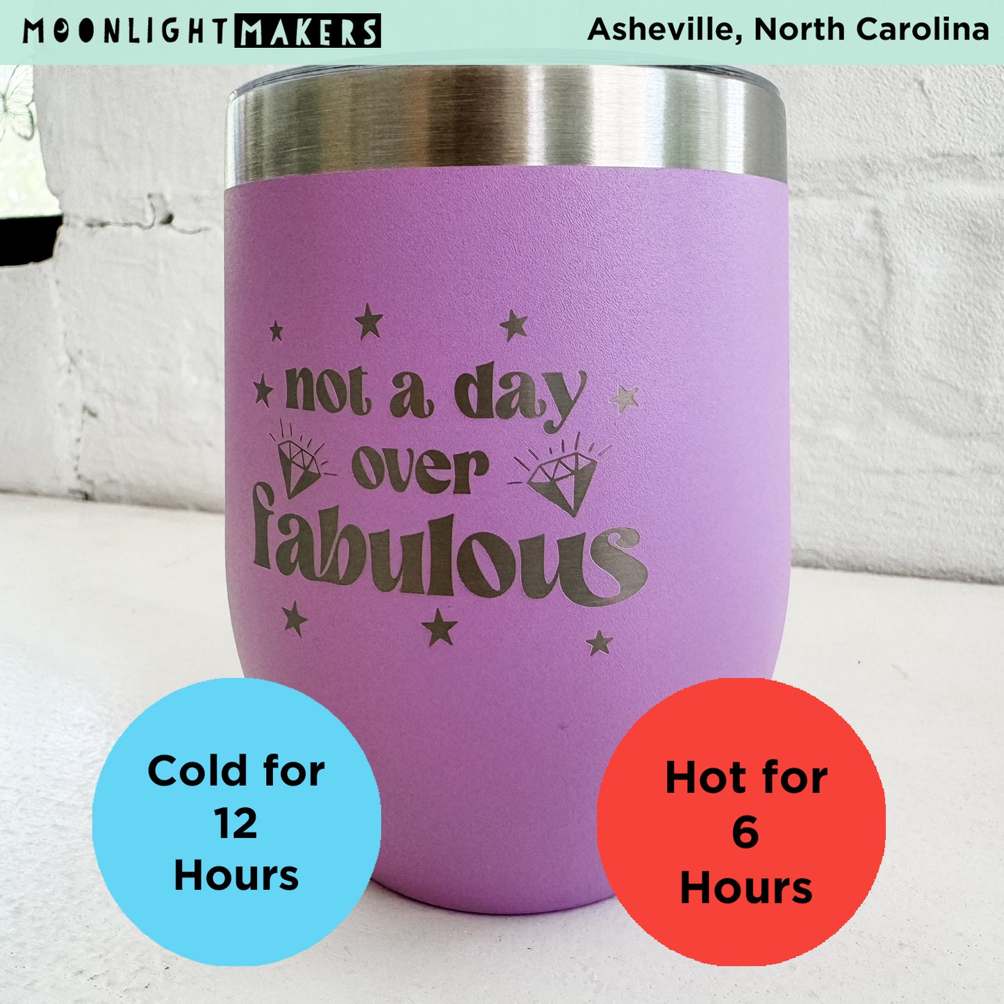 a purple tumbler cup with the words not a day over fabulous written on it