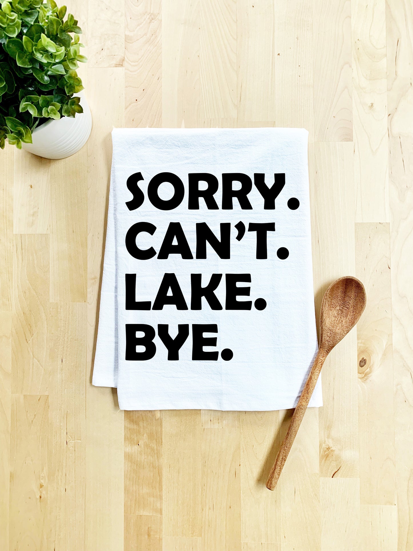 a tea towel that says sorry can't lake bye